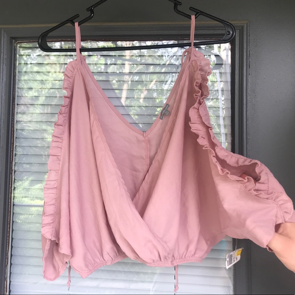 Charlotte Russe pink ruffled crop top.